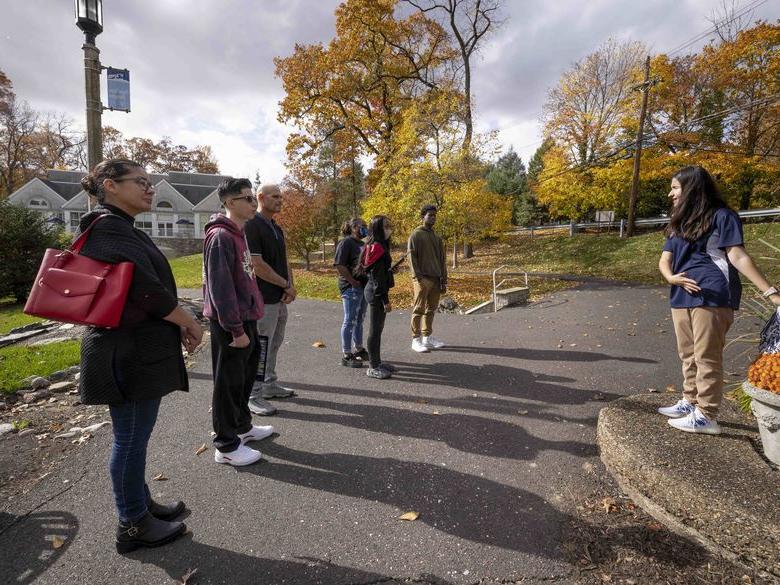 Student giving other admitted students a campus tour